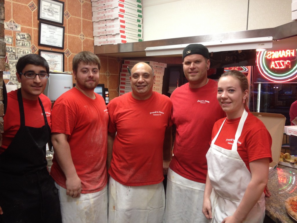 Frank’s Pizza Staff in the kitchen the night of their win. (Angelo in the middle)